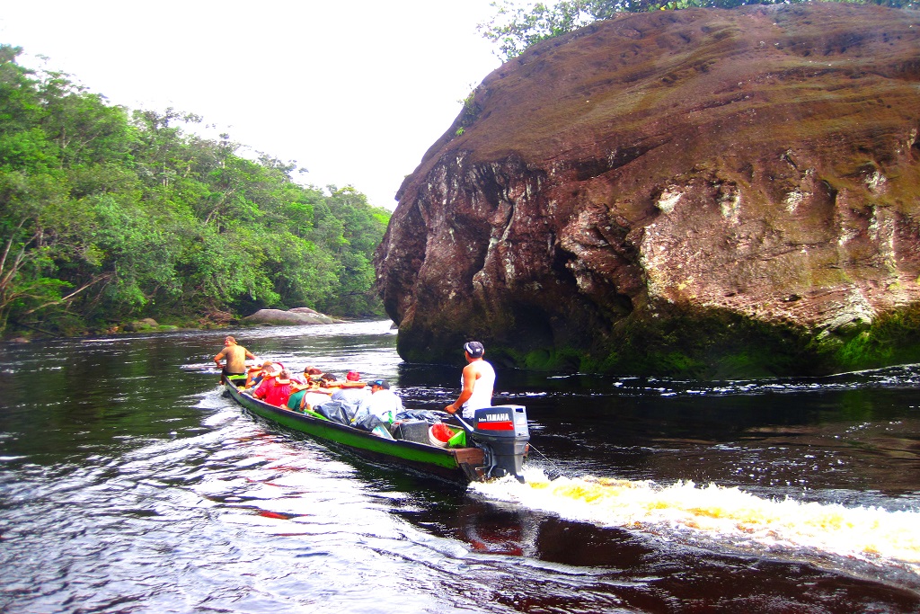 Saliing On A Curiara In The Churum River Via Angel Falls In The